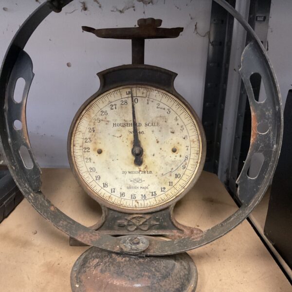 Vintage Salter scales with a circular pan and pound markings.