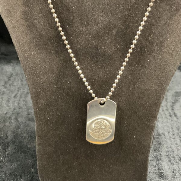 Vintage silver St Christopher necklace with detailed pendant.