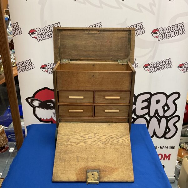 Vintage wooden stationery box with drawers, ideal for restoration.
