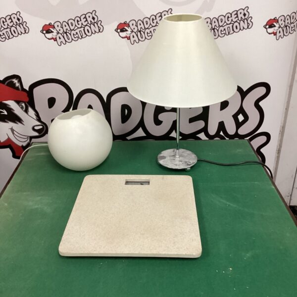 Vintage white table lamp with a classic mid-century modern design.