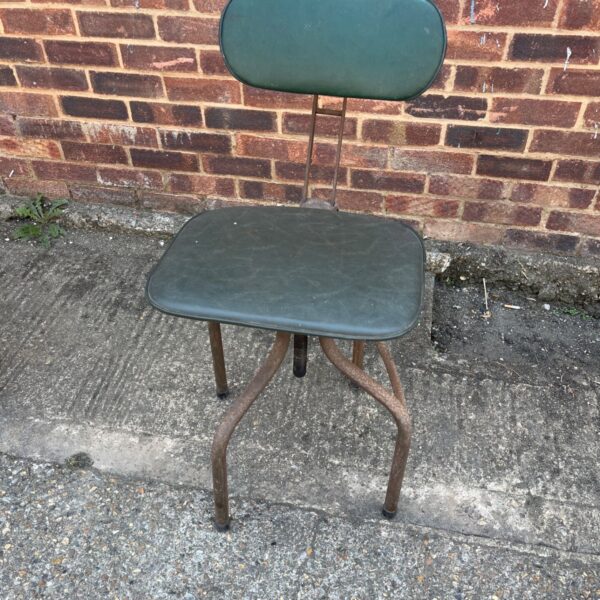 Vintage Tan-Sad industrial swivel chair with green seat.