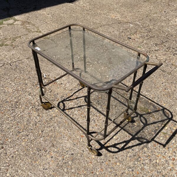 Vintage metal and glass tea trolley with two tiers.