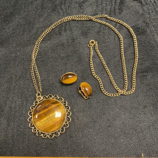 Vintage tiger eye necklace and clip-on earrings set in gold tone.