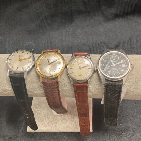 Lot of four vintage Tissot mechanical wristwatches on leather straps.