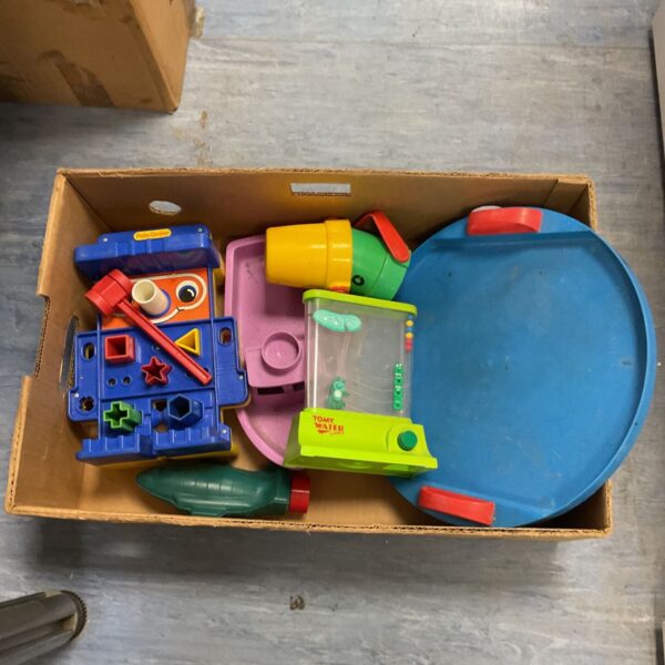 Vintage Tomy Water Game and colourful retro toys in a tray.
