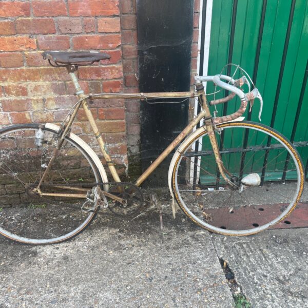 Vintage touring bicycle side view, classic road bike project.