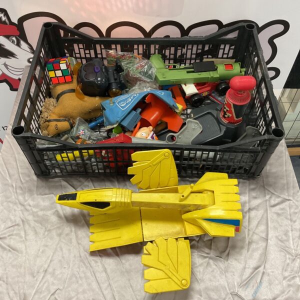 Vintage toy lot featuring a Rubik's Cube and toy soldiers.