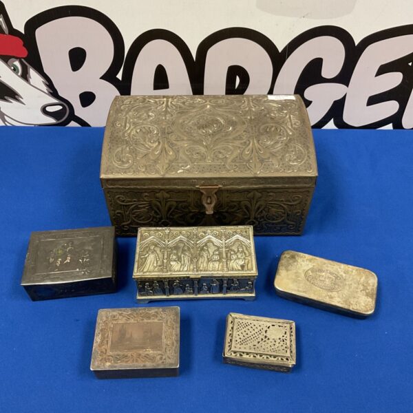 Vintage metal trinket boxes and fleur de lis tin chest for collectors.