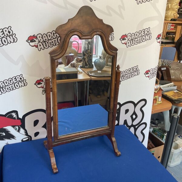 Vintage walnut framed dressing table mirror with arched design.