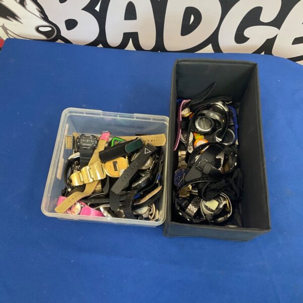Vintage watch collection lot with various wristwatches.