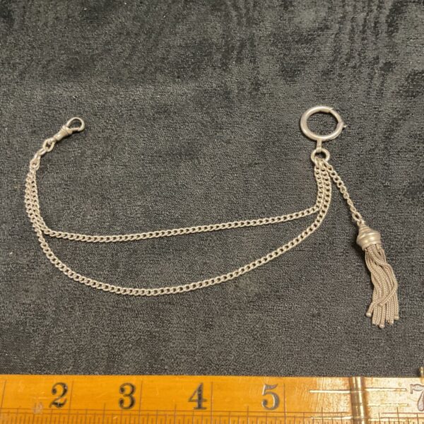 Vintage whitemetal fob chain with tassel and swivel clip.