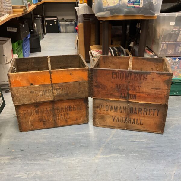 Vintage wooden crates including Crowley’s Brewery and Plowman Barrett branding.