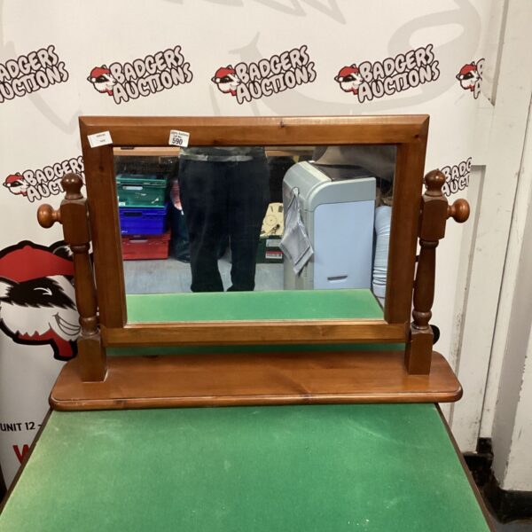 Vintage wooden dressing table mirror with aged patina.