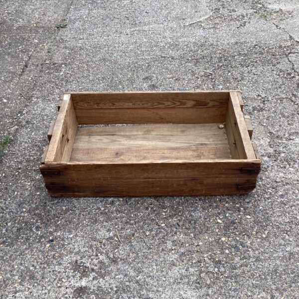 Vintage wooden storage box with rustic patina.