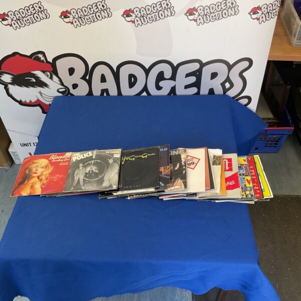 Vinyl singles collection featuring Blondie and The Police records.