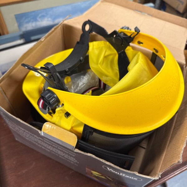 Yellow Vonhaus safety helmet with adjustable straps and visor.