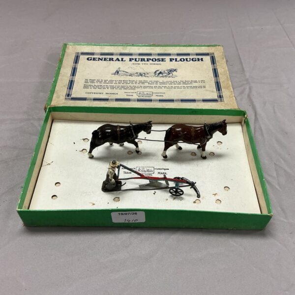 Vintage W Britain lead general purpose plough with horses.