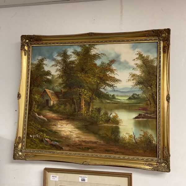 Vintage W Putz oil painting of a cottage and lake landscape.