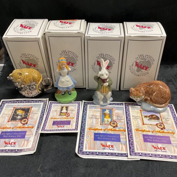 Wade Alice in Wonderland figures group, including Alice, Cheshire Cat, and White Rabbit.