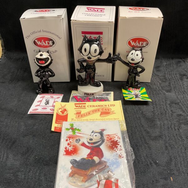 Three vintage Wade Felix the Cat figures in original boxes.