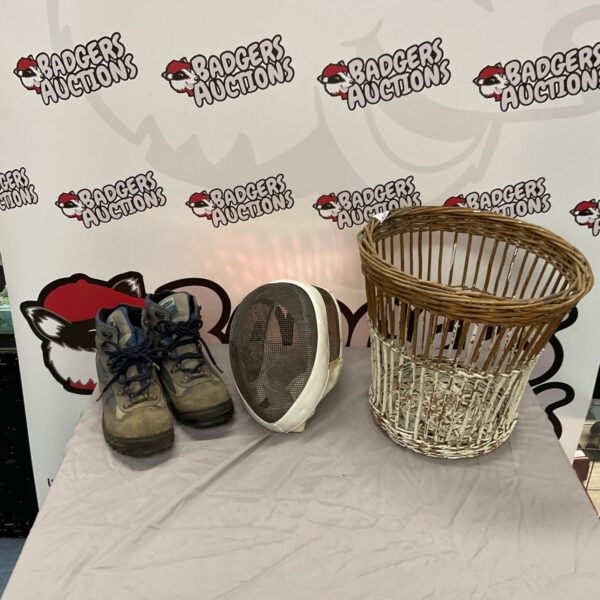 Walking boots and fencing mask, vintage sports equipment.
