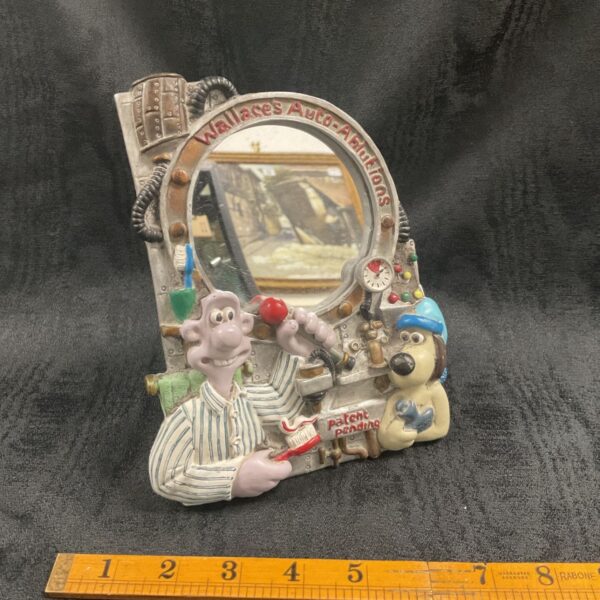 Wallace and Gromit Auto Ablutions mirror, a collectible character item.