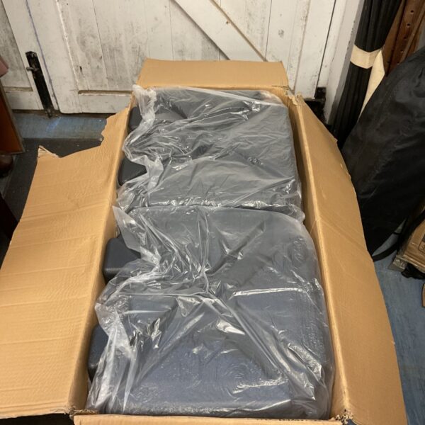 Plastic water flag base inside a cardboard box.