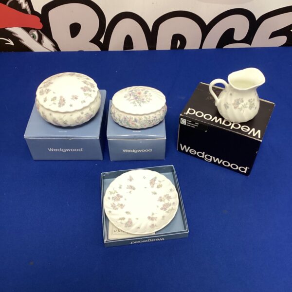 Wedgwood April Flowers collection featuring a milk jug and dishes.