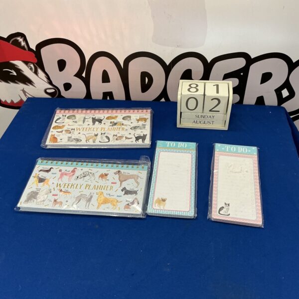 Vintage weekly planner set with wooden calendar on display.