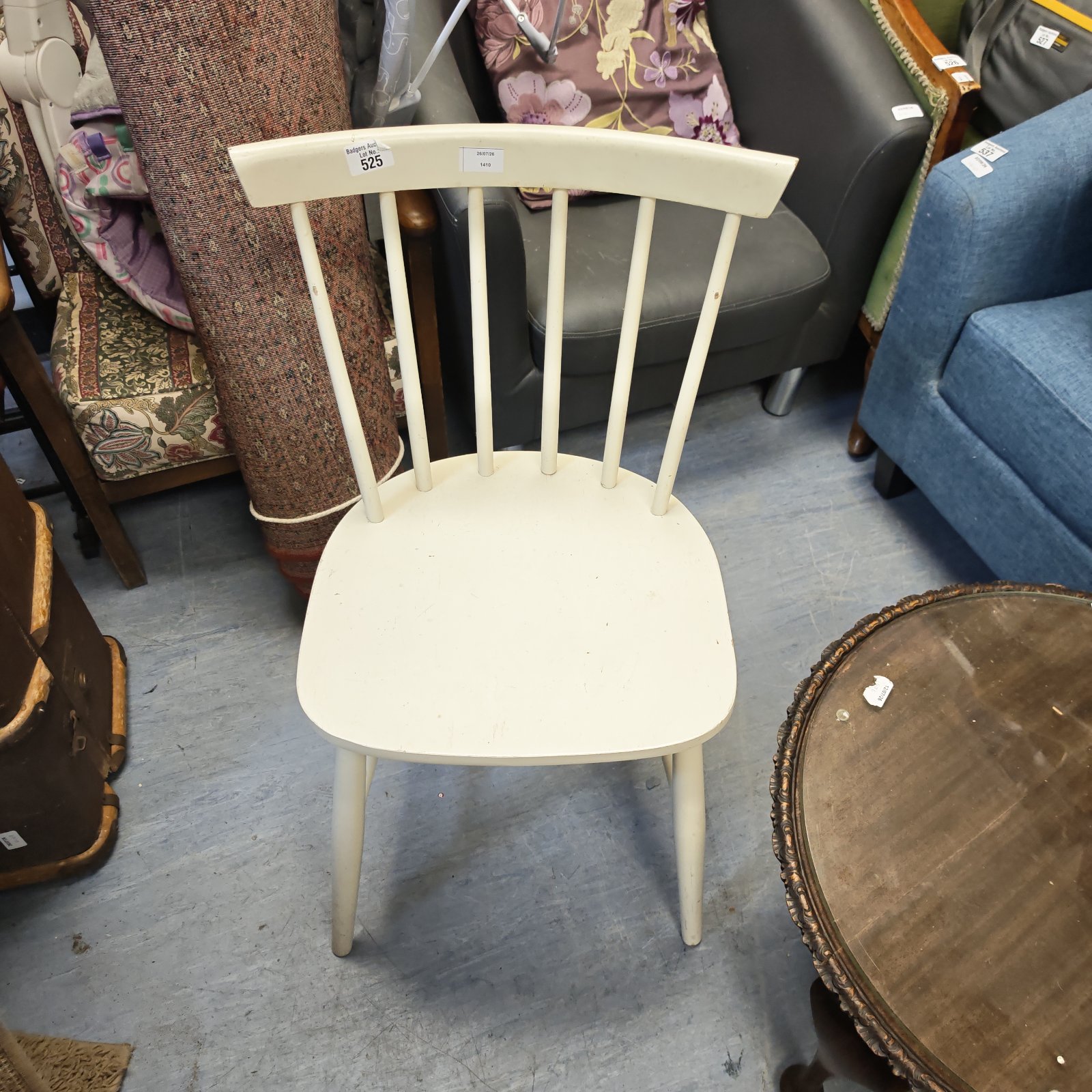 White painted vintage bedroom chair with spindle back.