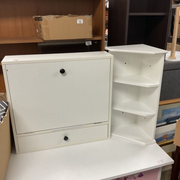 White corner shelf unit with cabinet and open shelving.