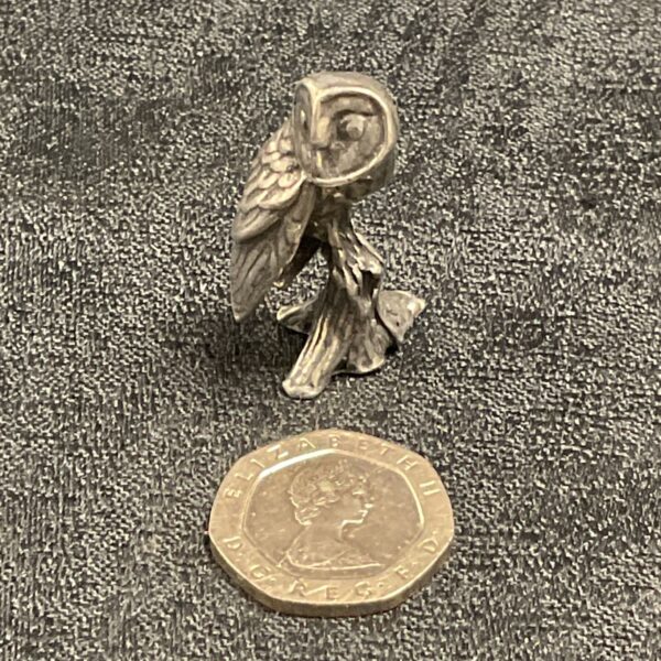 Detailed miniature whitemetal owl figurine, a vintage collectible.