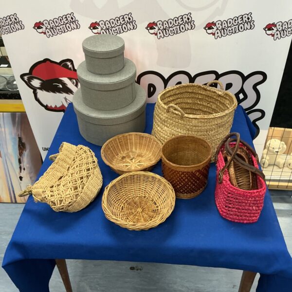 Vintage wicker baskets and round storage boxes in a mixed lot.