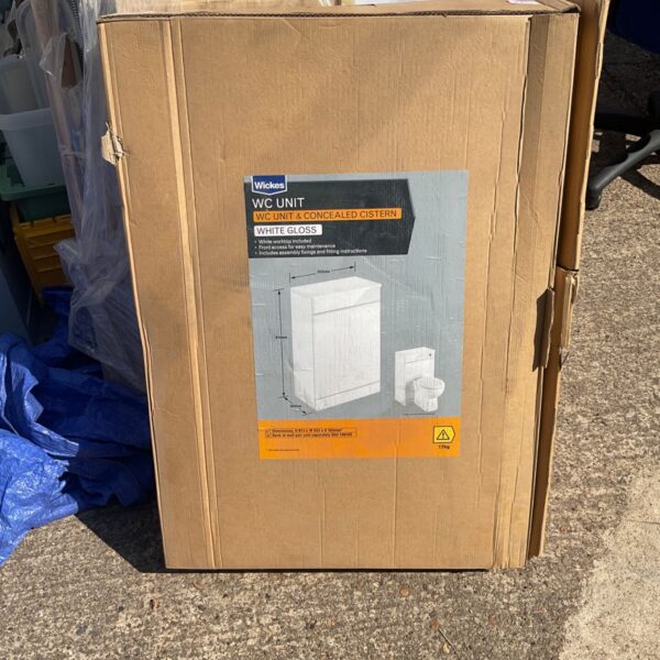 White Wickes concealed cistern unit for bathroom renovation.