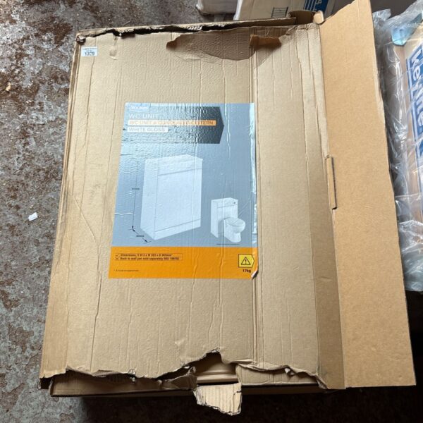 Dismantled Wickes WC unit in white gloss packaging.