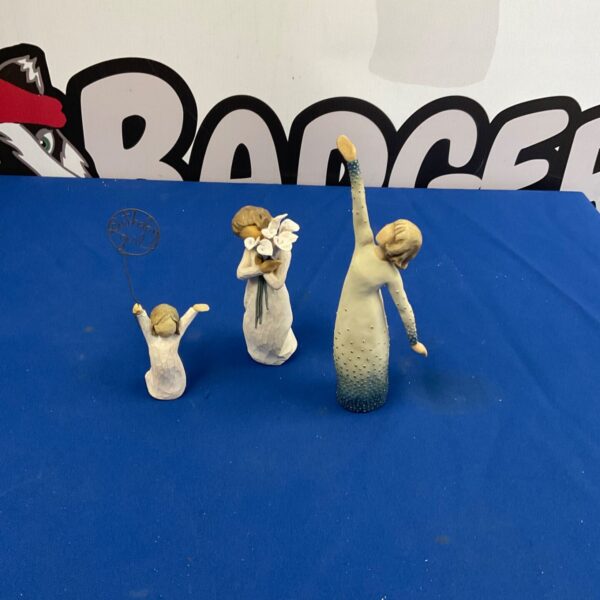 Lot of three Willow Tree figurines for collectors and home decor.