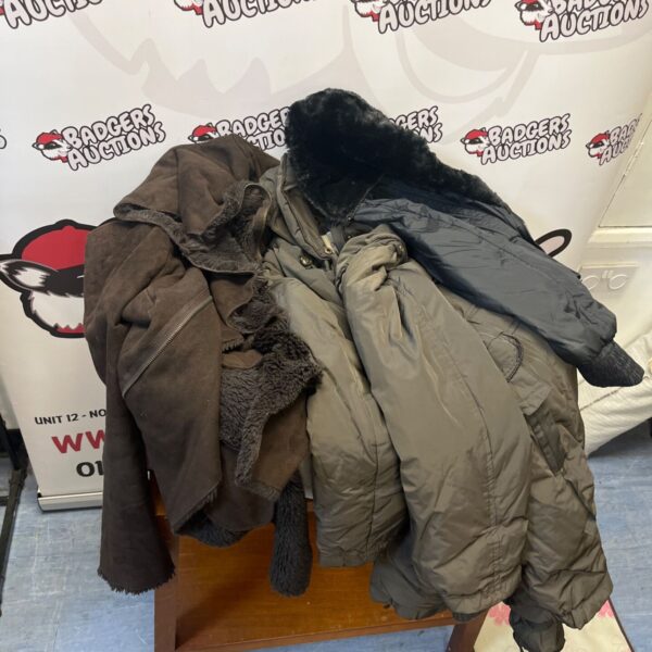 Bundle of winter coats including a Zara coat for cold weather.