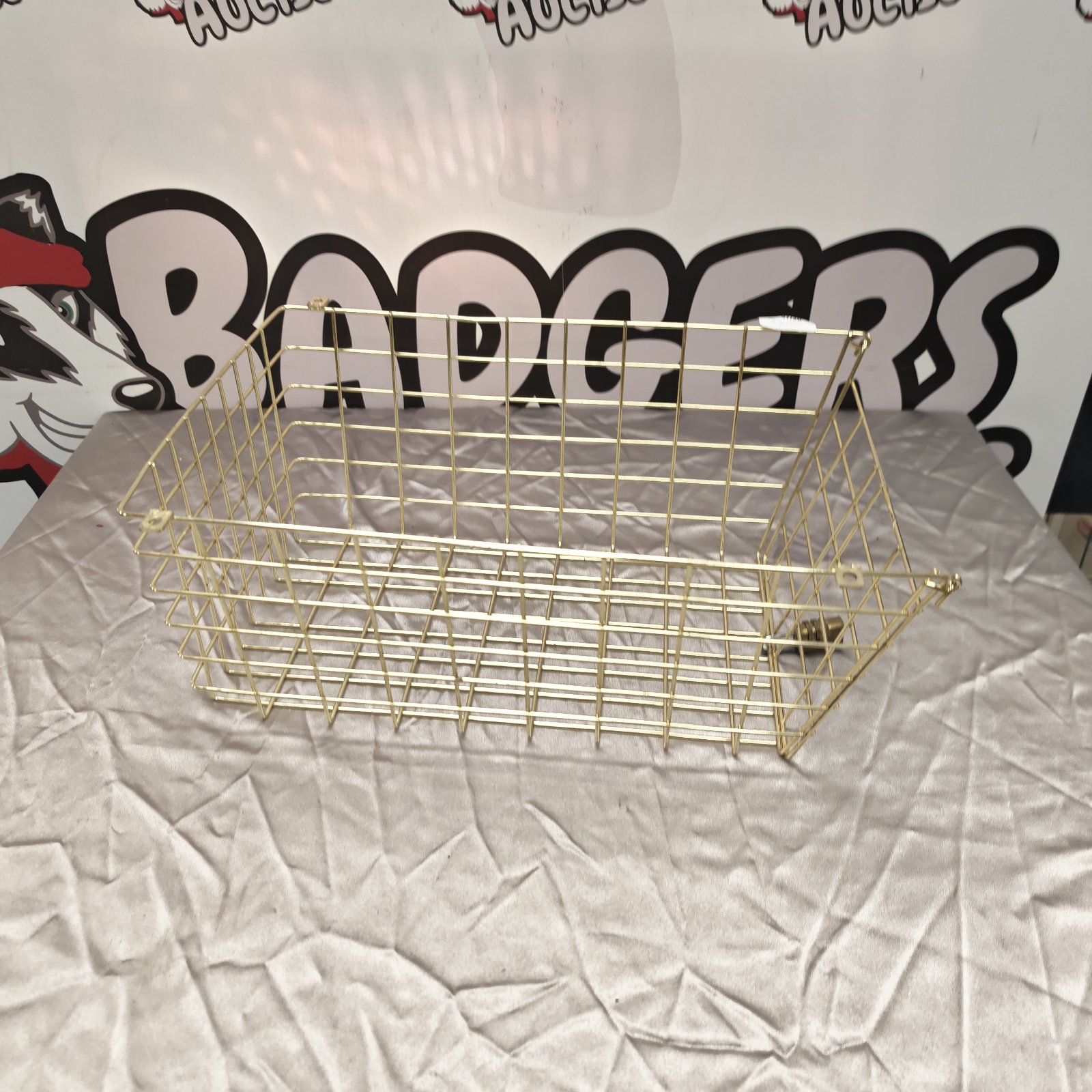 Vintage metal wire basket for storage and display.
