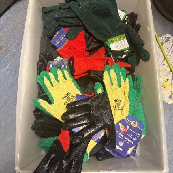Box of new 10XL work gloves for gardening and DIY projects.