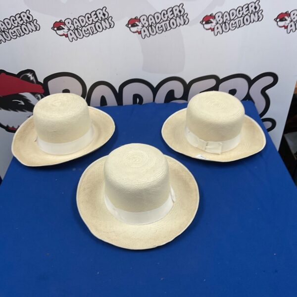 Vintage woven wide brimmed hat, classic Panama style straw sun hat.