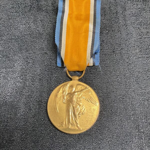 WW1 Victory Medal named to A.V.C. soldier, a collectible war medal.
