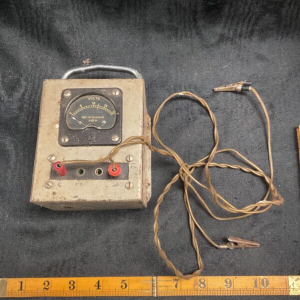 Vintage WWII Air Ministry voltmeter, reference number 5u/1636, for electrical testing.