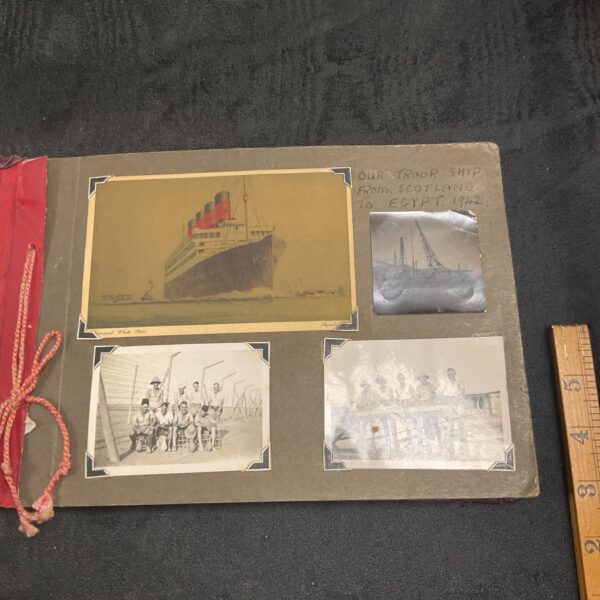 Vintage WWII photo album cover from 1942 showing ship image.