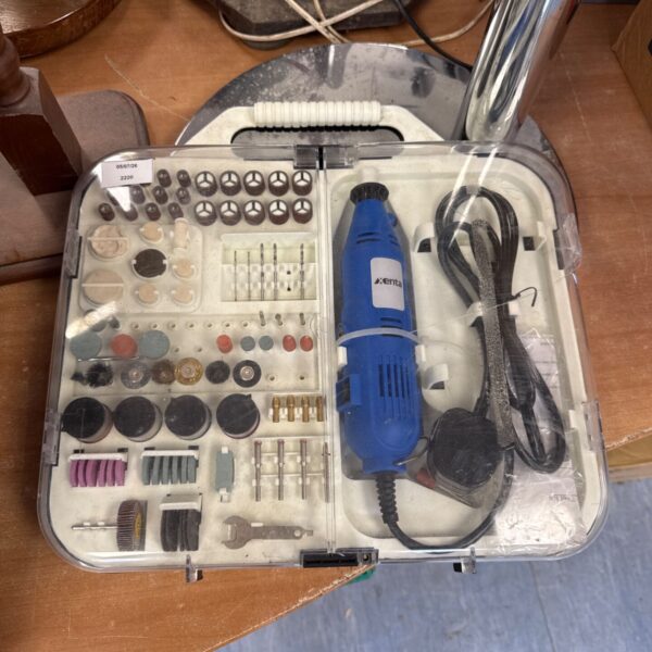 Xenta drill set open with various drill bits and accessories.