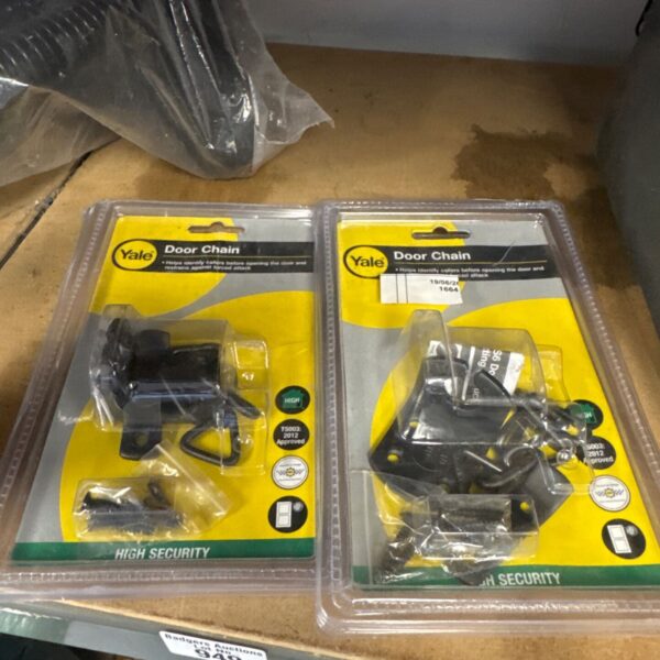 Yale door chain model 1964 in original packaging.