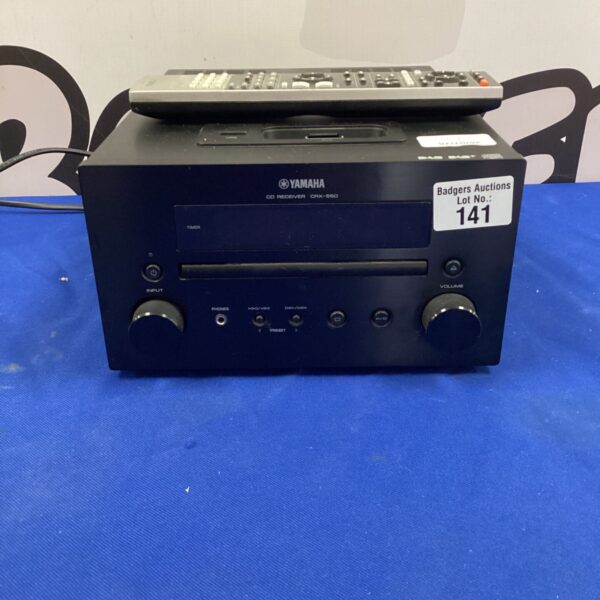 Yamaha CRX-550 CD receiver with iPod dock and remote control.