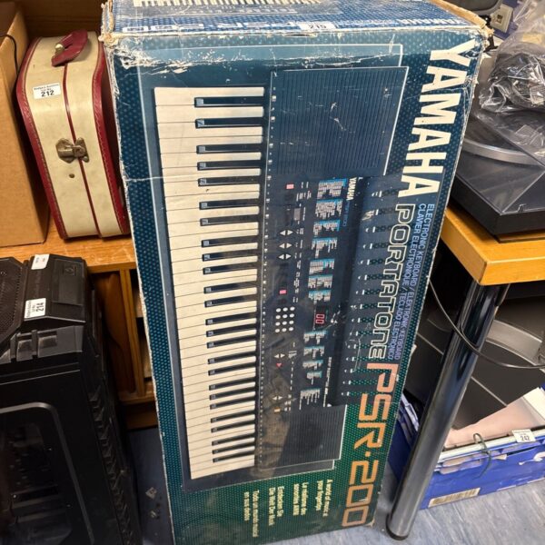Yamaha Portertone PSR-200 keyboard in original box, vintage instrument.