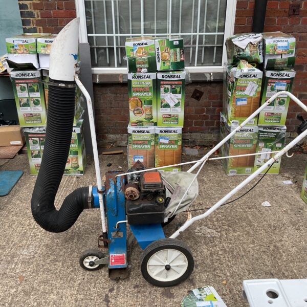 Blue YardVark leaf vacuum and chipper/shredder with intake hose.
