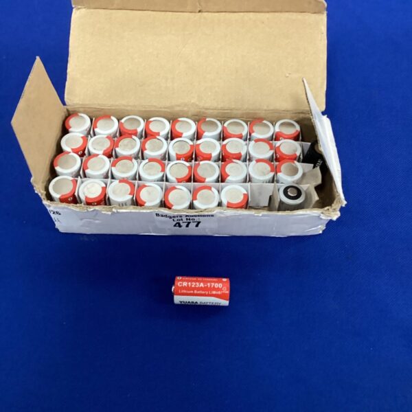 Box of Yuasa CR123A-1700 lithium batteries for electronic devices.