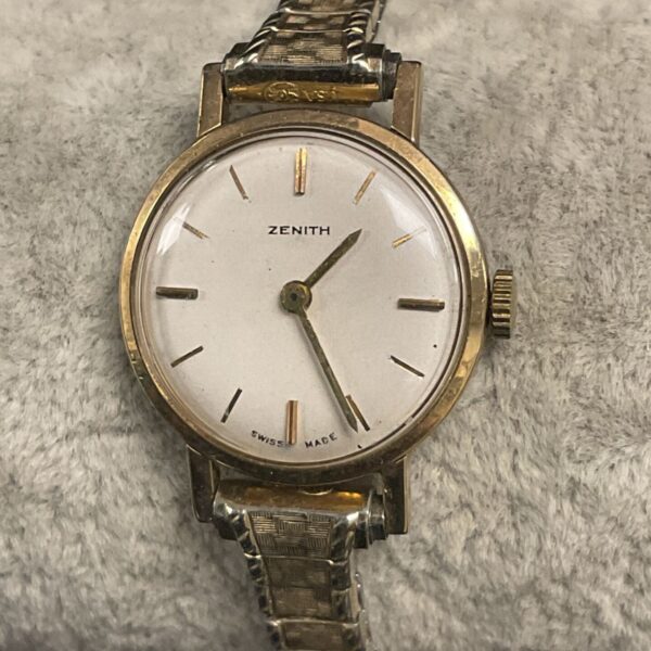 Vintage Zenith .375 gold ladies watch with white dial.